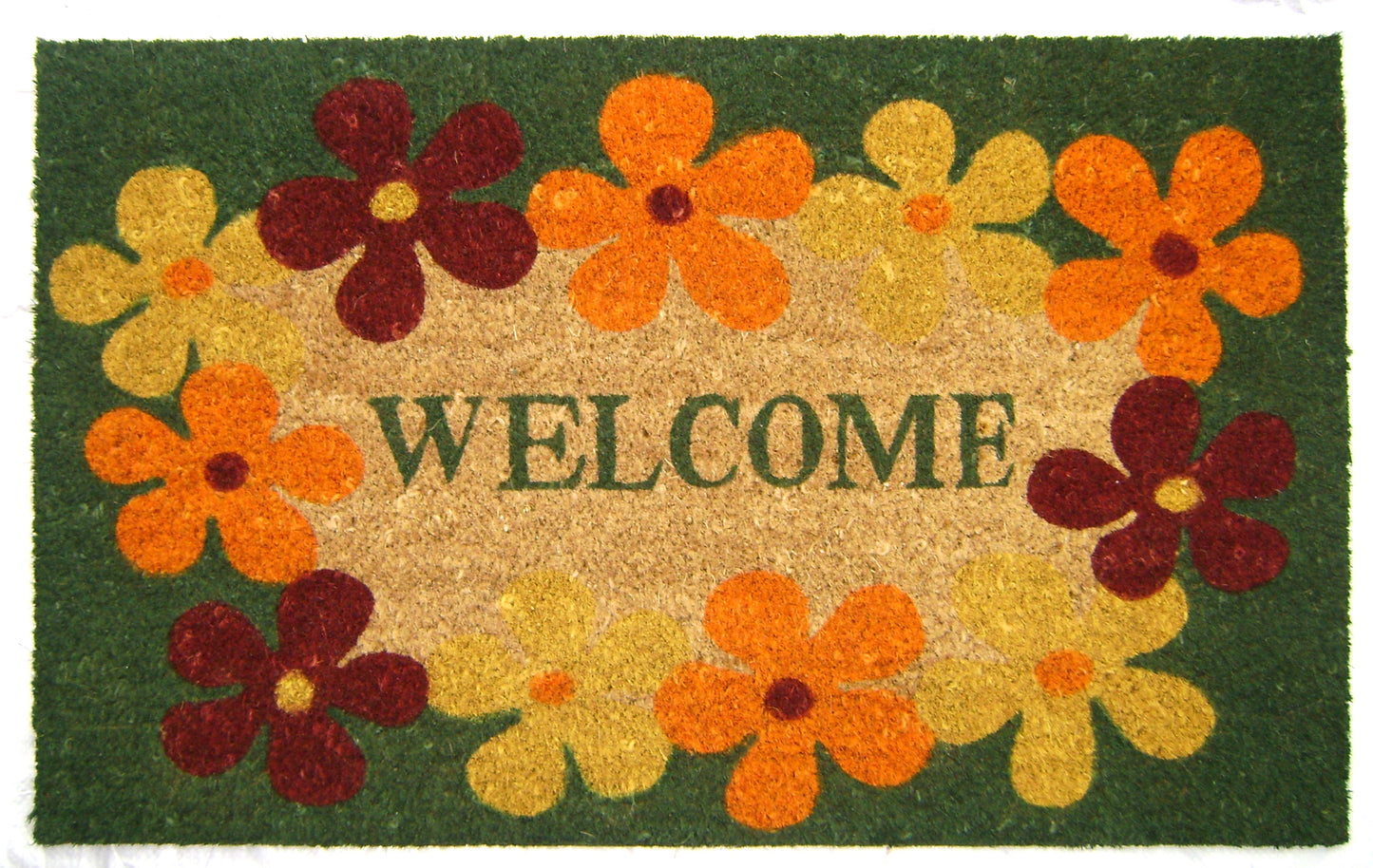 Doormat with floral design and 'WELCOME' text on a green background