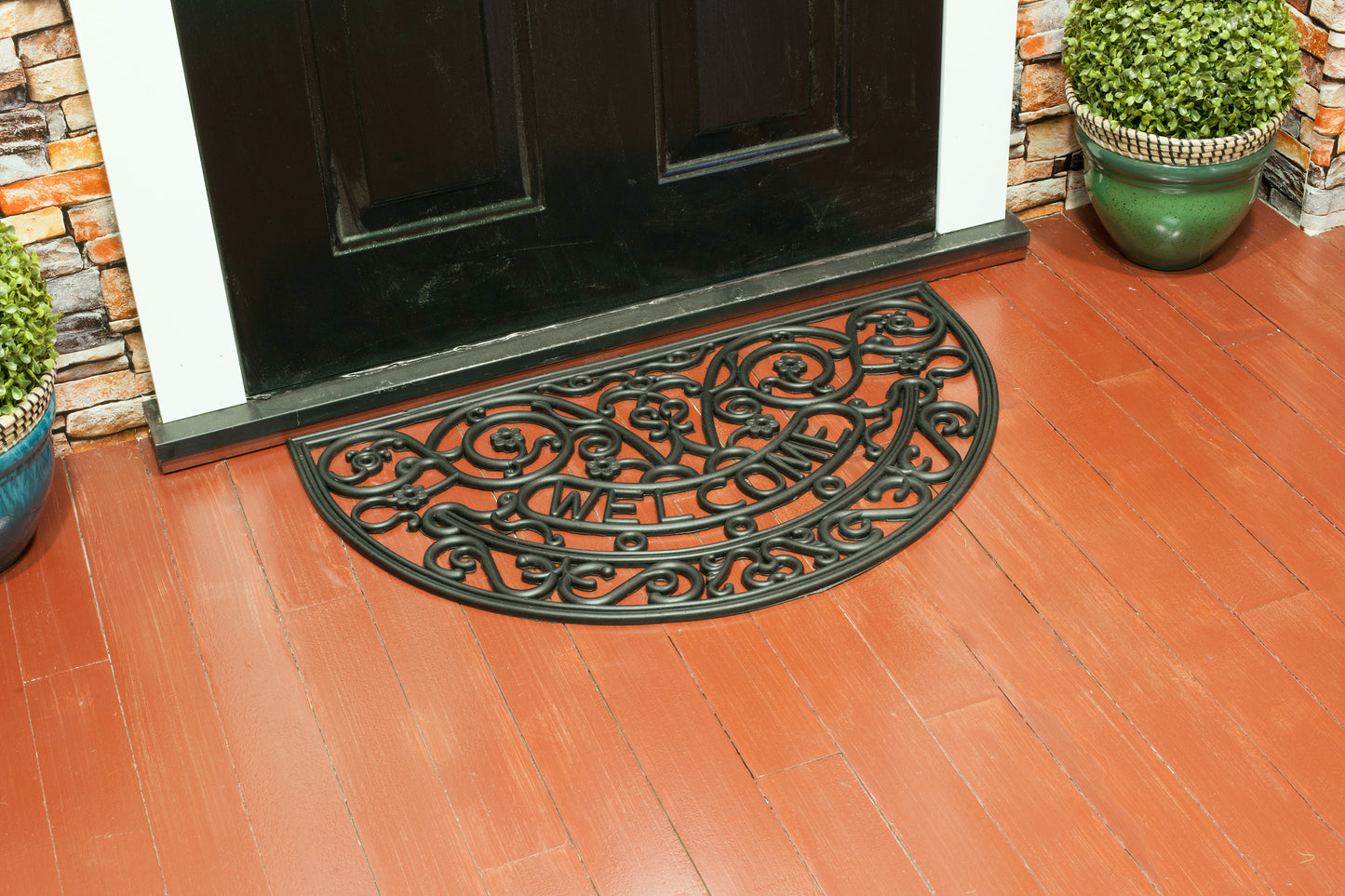 black rubber door mat with semicircle welcome design
