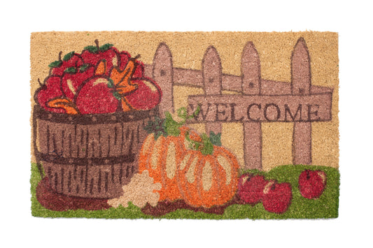 Decorative doormat with pumpkins, apples, and a 'Welcome' sign on a beige background
