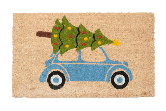 Doormat with a blue beetle car carrying a Christmas tree design on a beige background