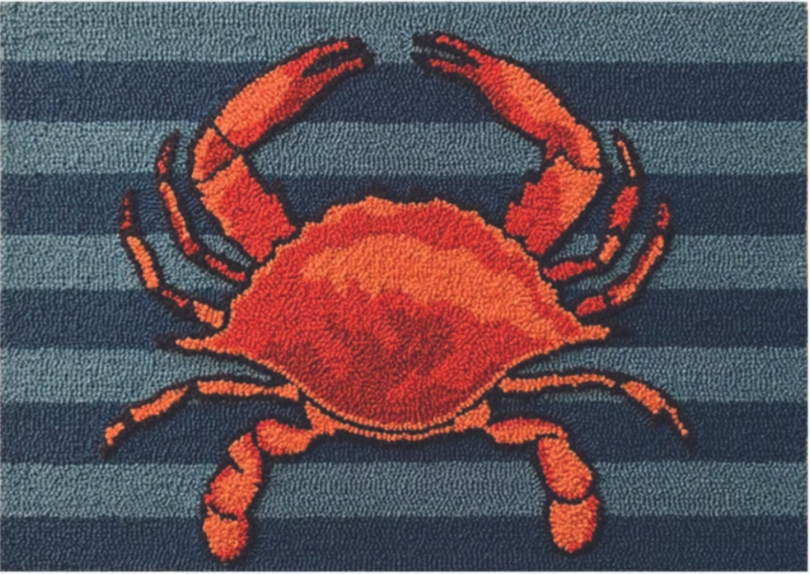 blue and grey accent rug with crab design