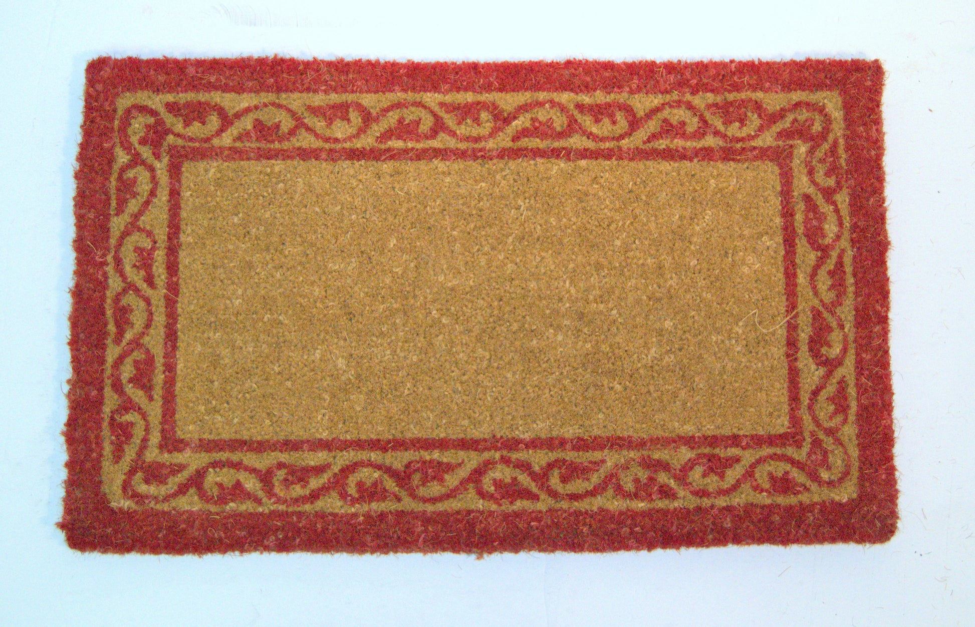 Rectangular doormat with red border on a white background