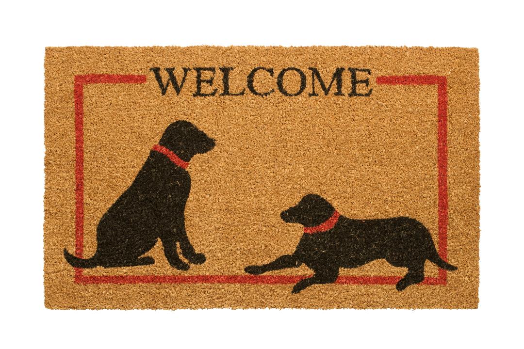 Doormat with silhouettes of two dogs and the word 'WELCOME' on a beige background