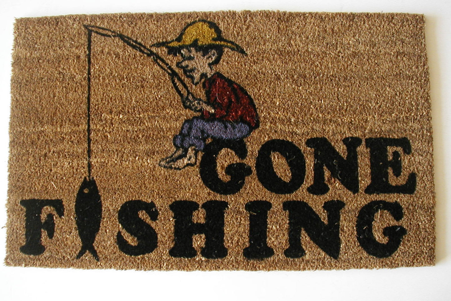 Doormat with a cartoon fisherman and 'Gone Fishing' text on a brown background