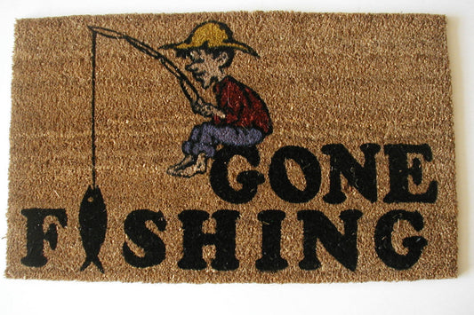 Doormat with a cartoon fisherman and 'Gone Fishing' text on a brown background