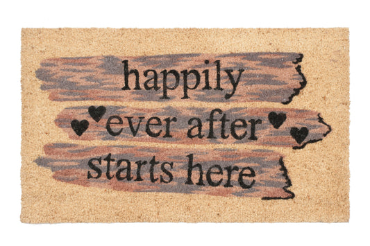 Doormat with 'happily ever after starts here' text and heart symbols