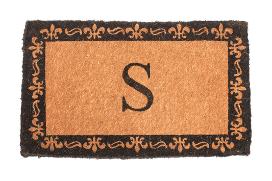 Doormat with decorative border and letter 'S' on a white background