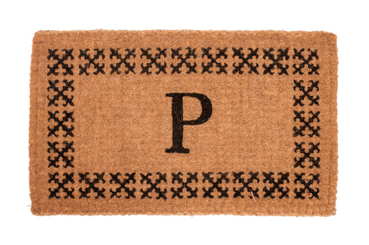 Doormat with black pattern and letter 'P' on a white background