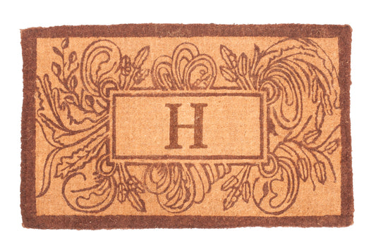 Doormat with decorative border and letter 'H' on a white background