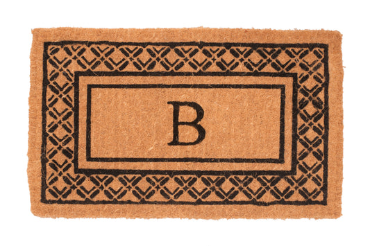 Doormat with a black geometric border and letter 'B' on a white background