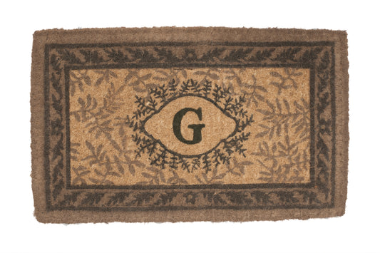 Doormat with a decorative border and letter 'G' in the center on a white background