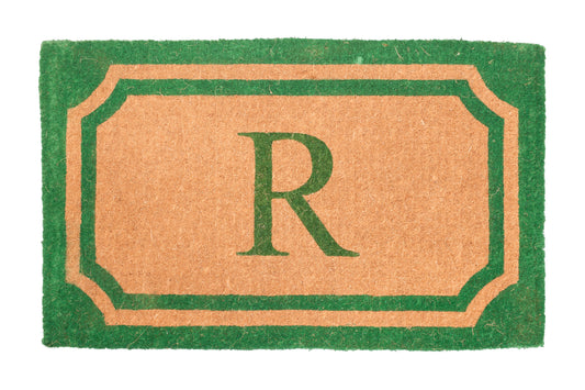Doormat with a green border and letter 'R' on a beige background