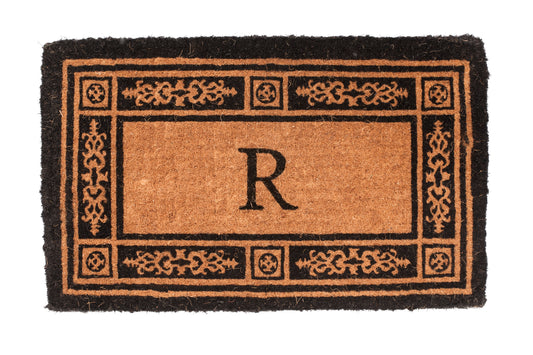 Doormat with decorative border and letter 'R' on a white background