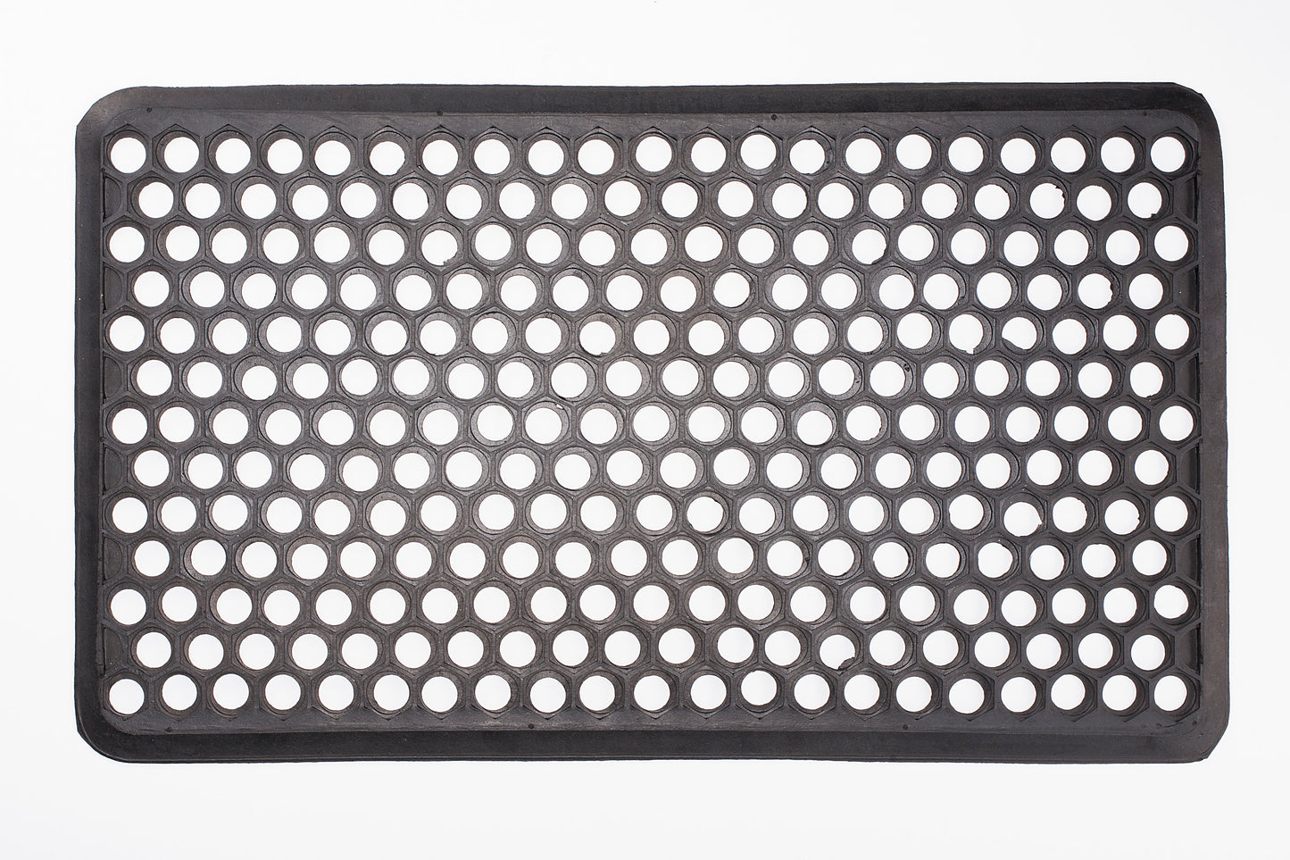 Black perforated mat on a white background