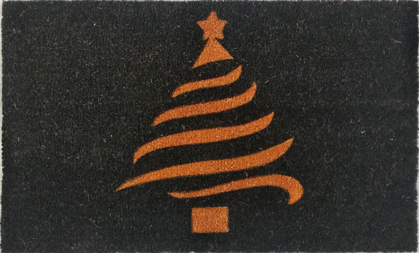 Black doormat with an orange Christmas tree design on a dark background