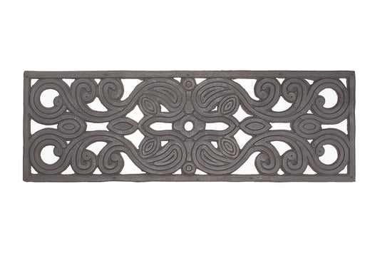 Decorative rubber stair mat with intricate patterns on a white background