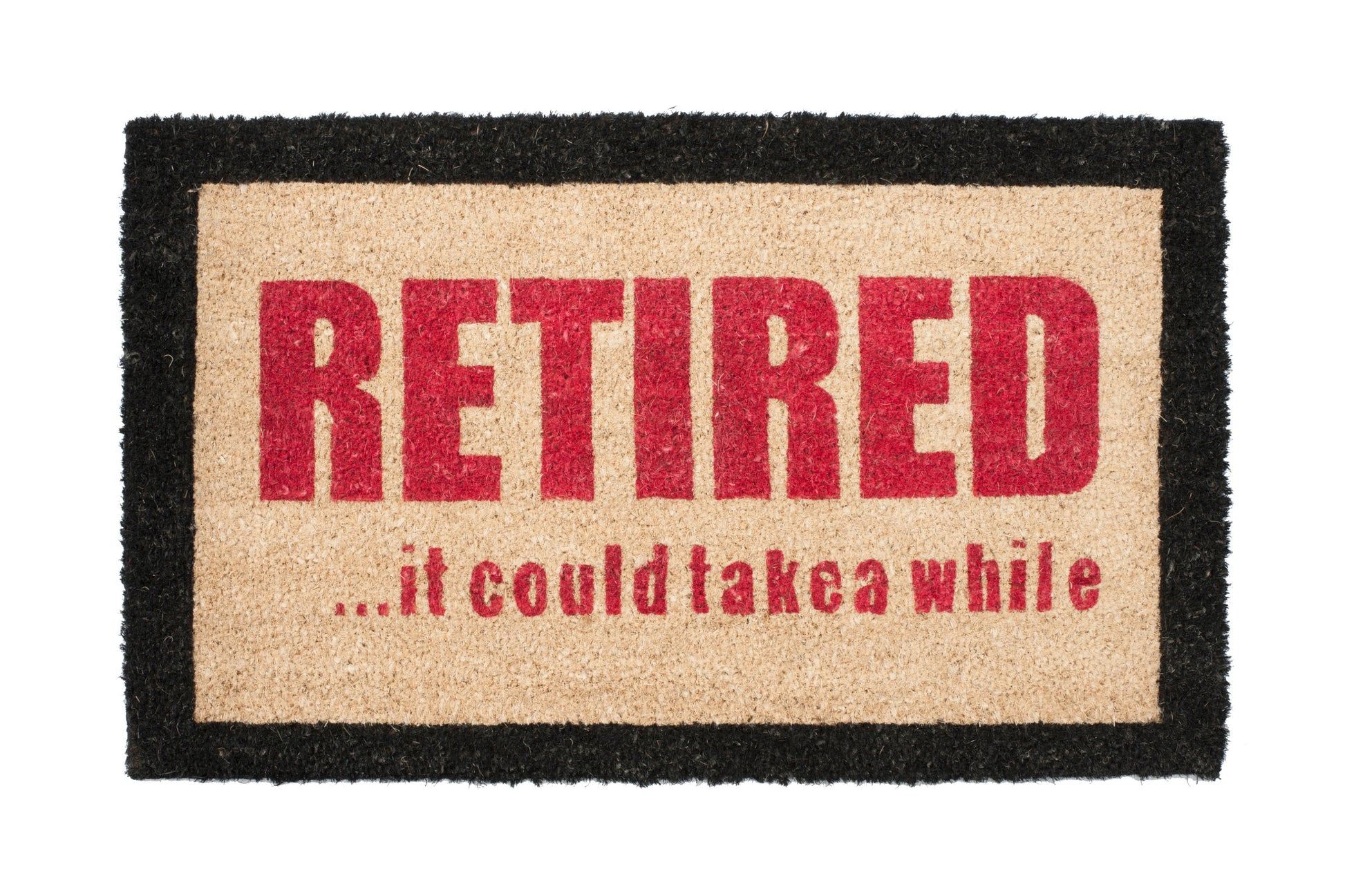 Doormat with 'RETIRED... it could take a while' text on a white background