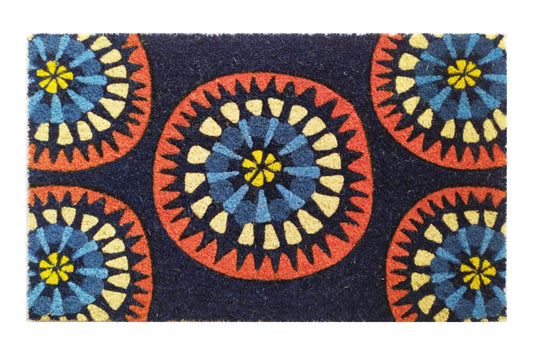 Decorative doormat with circular patterns in blue, red, and yellow on a dark background